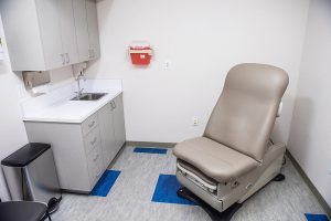 Chair beside a sink